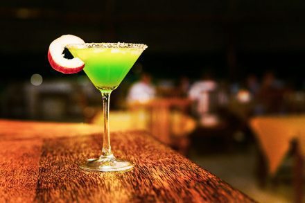 green cocktail prepared at the White Zanzibar Hotel